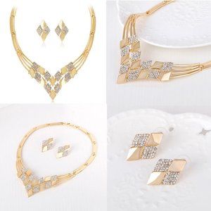 a necklace-, and a set of   pierced earrings